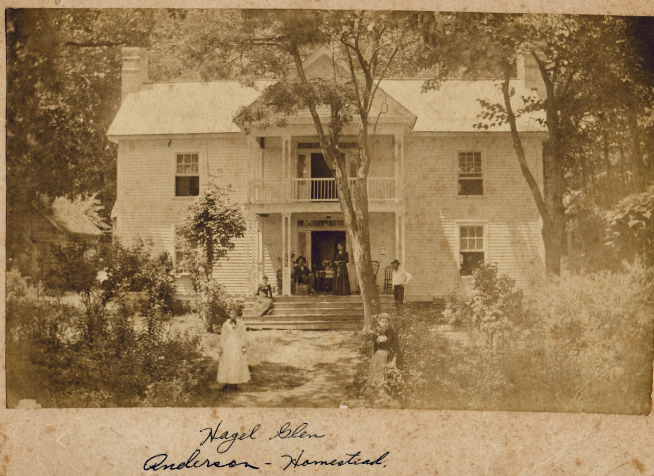   View from the first homestead of Hugh Allen Anderson that was burned during the Civil War.  The people in the photo are unconfirmed but likely members of the Anderson Family.  You can see the wooden cabin to the left that Steve Anderson refers to in the interview.  